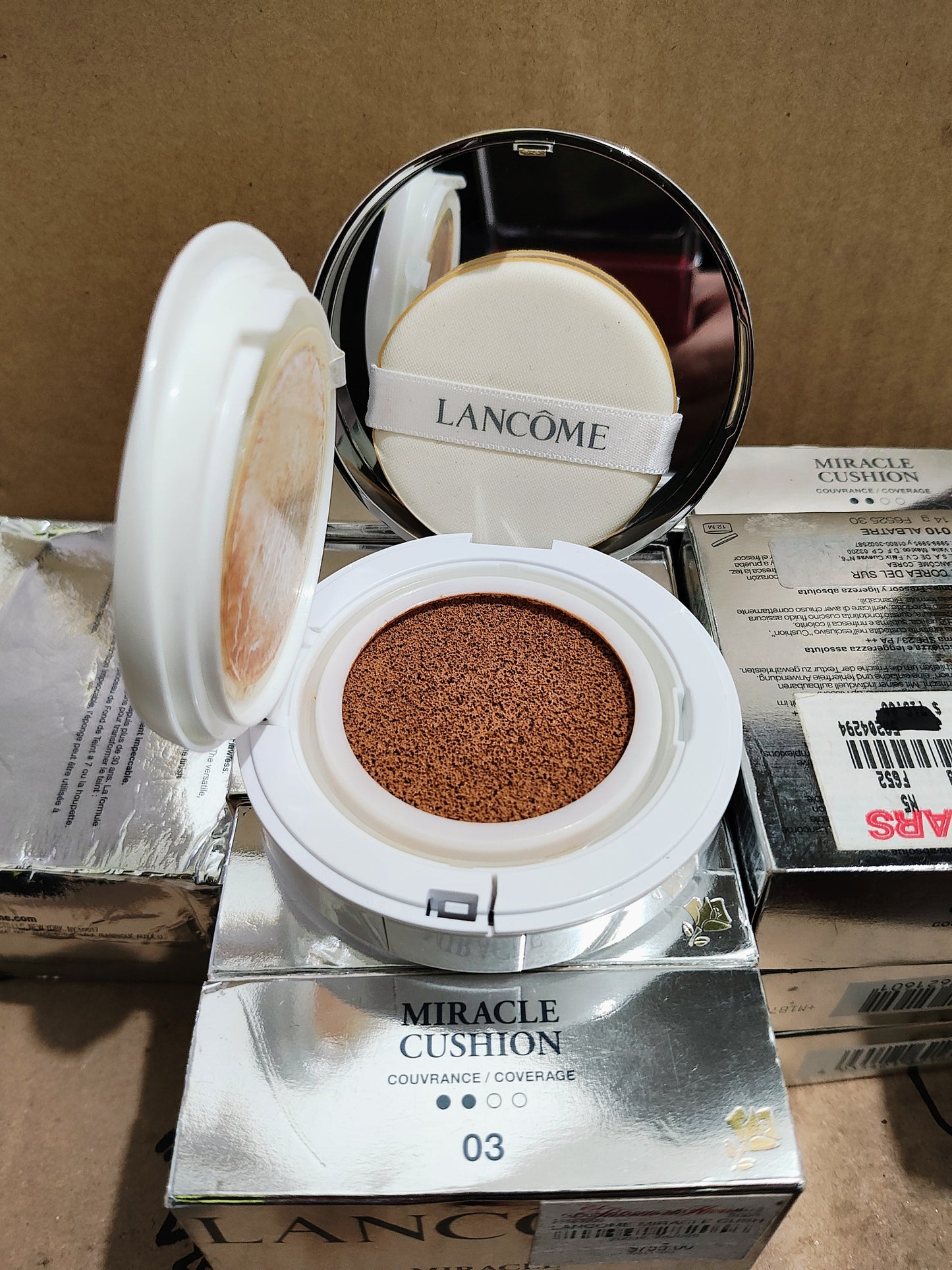 Base de maquillaje compacta Miracle Cushion Liquid Cushion SPF 23 -